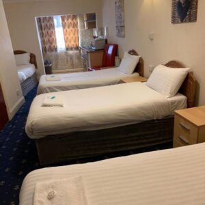 Quadruple – Studio (4 single beds)