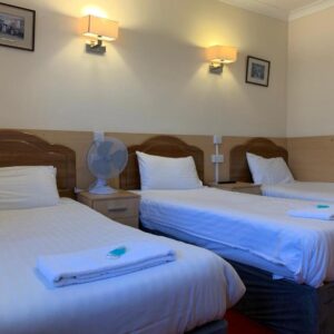 Triple Room ( 3 persons – 3 single beds)