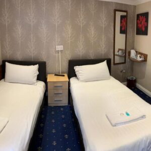 Twin Room (2 person – 2 single beds)